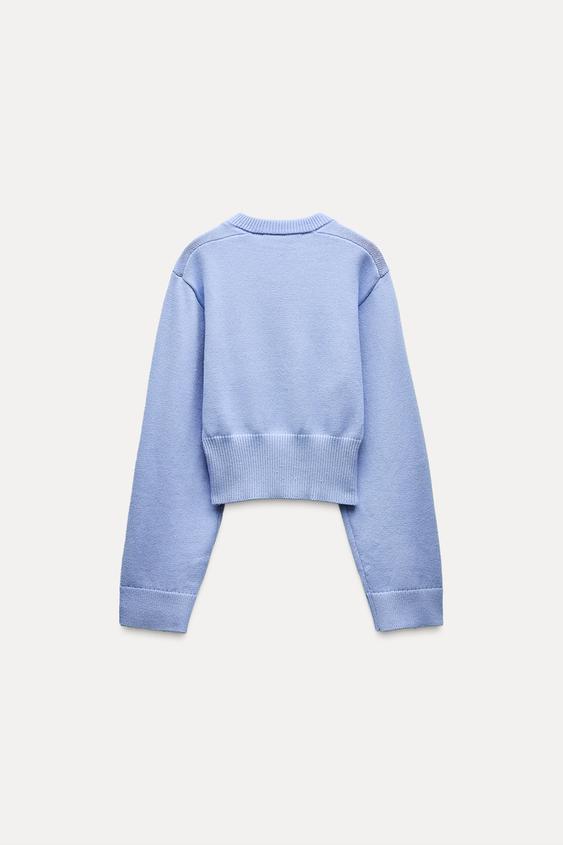 Kurzer Strickpullover mit weiten Ärmeln 9